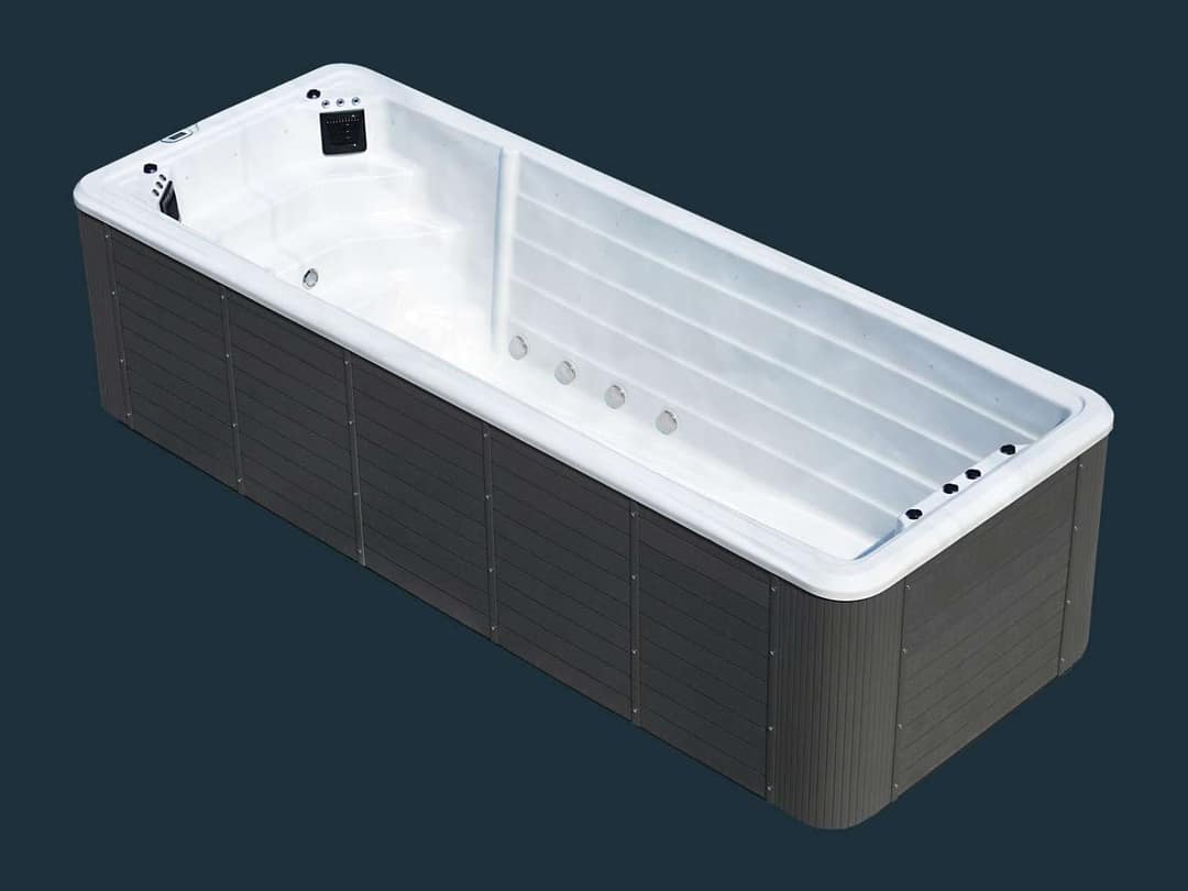 Darstellung eines weissen Swimspa mit einer Zone und dunkelgrauer Verkleidung, schräg von oben